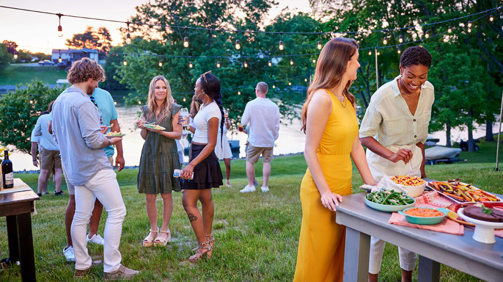 Photo of july birthdays with an outdoor party.