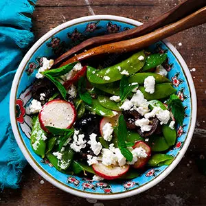 August recipes with a bowl of snap peas and other vegetables