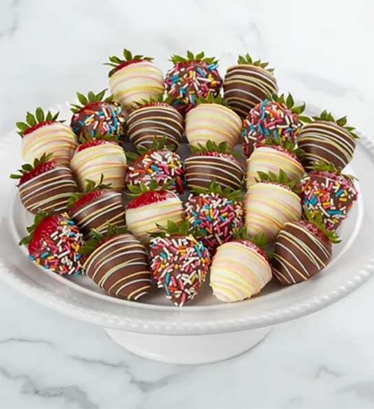 Party themes for adults with chocolate covered strawberries on a plate.