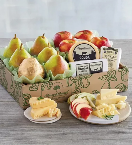 Party themes for adults with a box of pears, apple and cheese.