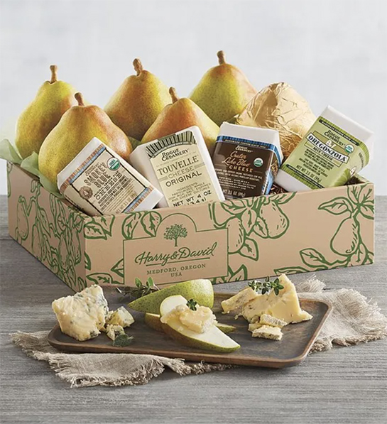 Pear harvest with a box of pears and cheese.