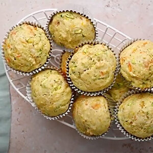September recipes with a basket of savory zucchini carrot muffins.