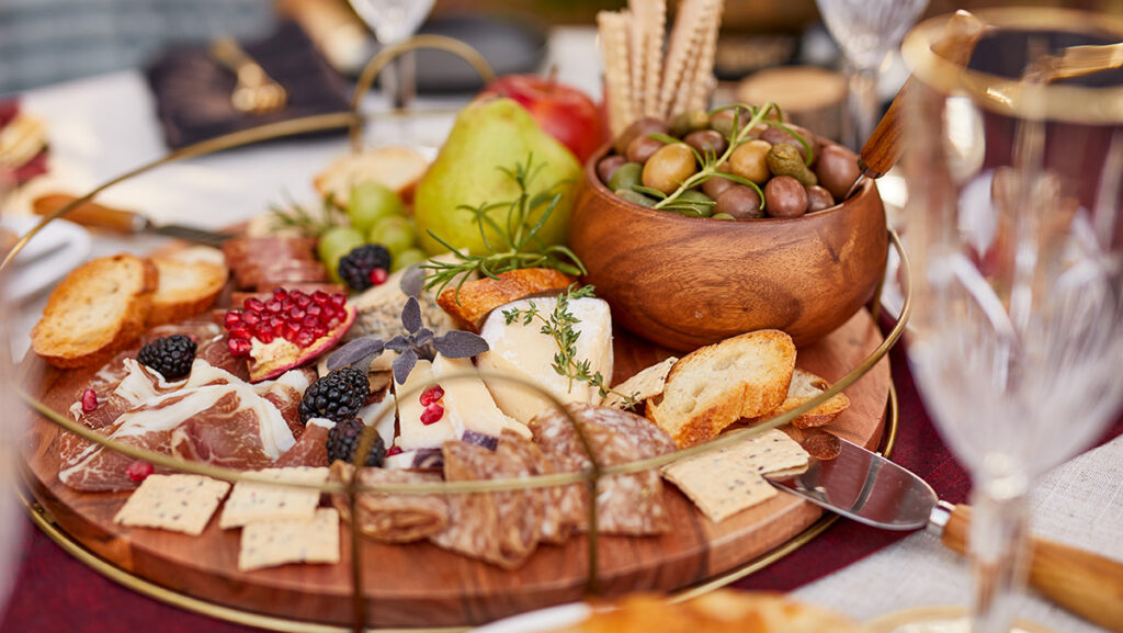 Fall birthday party with a closeup of a harvest charcuterie board.