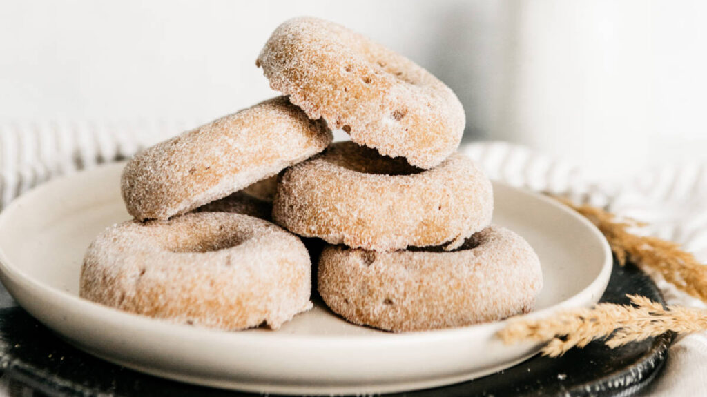 Fall recipes with a plate of apple donuts