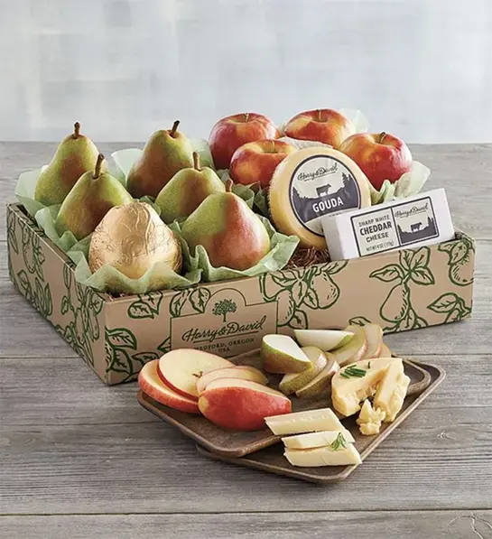 Office superstars gift box full of pears, apples and cheese.