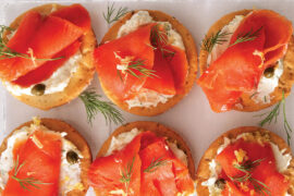 Smoked salmon appetizer on a platter.