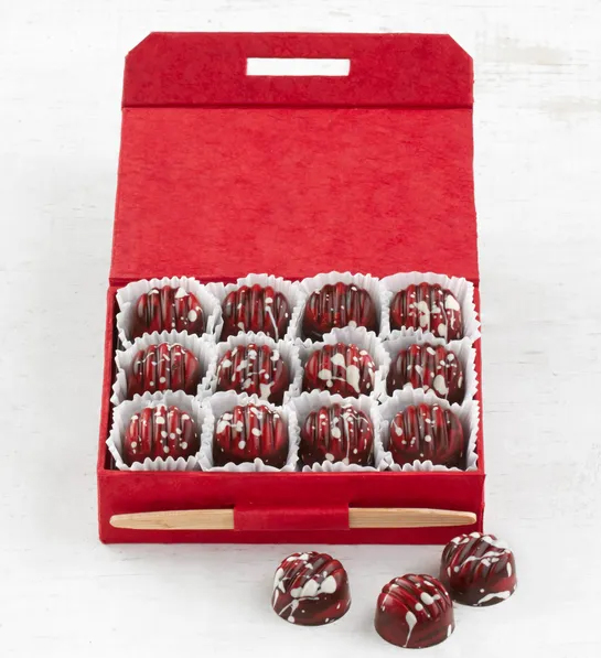 Best gifts with a box of mulled wine truffles decorated with chocolate.