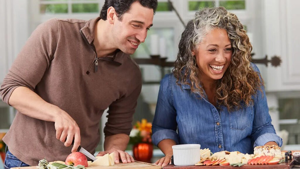 Fall date ideas with a man and woman taking a virtual cooking class.
