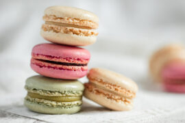 Macaroon vs macaron with a stack of macarons