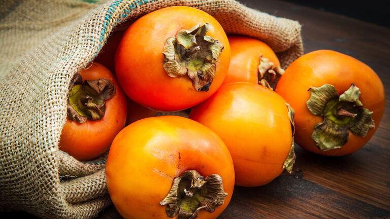 Persimmons in a bag.