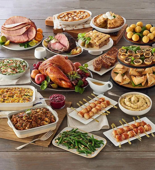 Can you fly with Thanksgiving food with a deluxe holiday meal on a table.