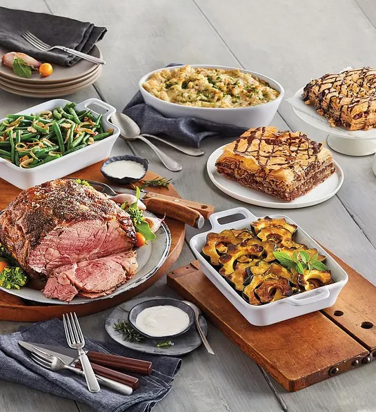 Can you fly with Thanksgiving food with a gourmet prime rib feast on a table.