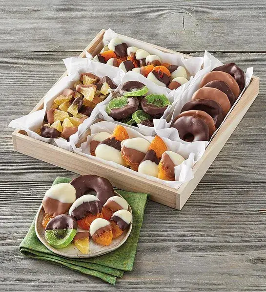 Gifting matrix with a box of fruit that's been dipped in chocolate