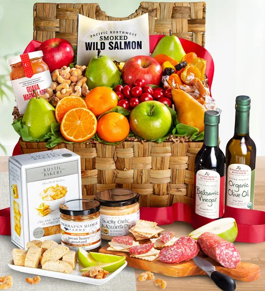 Gifting matrix with a hamper full of fruit, crackers, and other snacks surrounded by bottles of wine and more snacks.