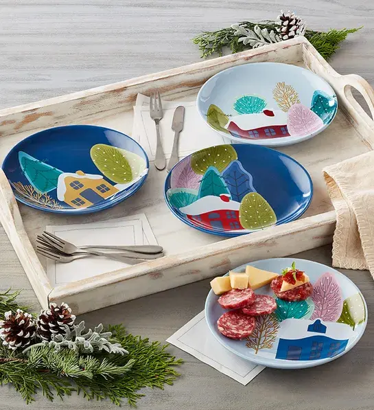 White elephant gift ideas with four holiday themed appetizer plates on a tray.
