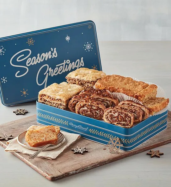 White elephant gift ideas with a tin of baklava and other baked goods.