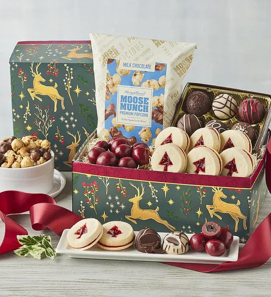 White elephant gift ideas with a box full of chocolates, truffles and cookies.
