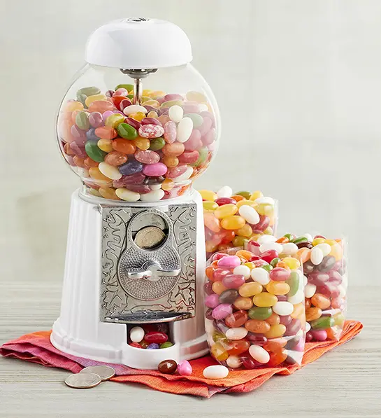 Best gifts with a vintage candy dispenser next to bags of candy.