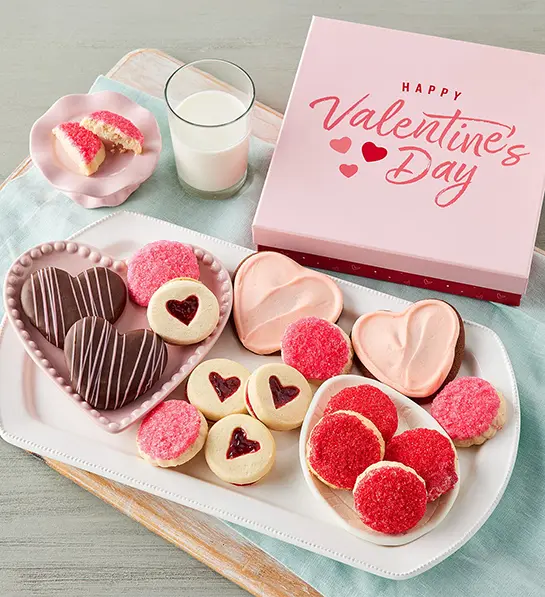 Valentine's Day gifts for her with a box of heart shaped cookies.