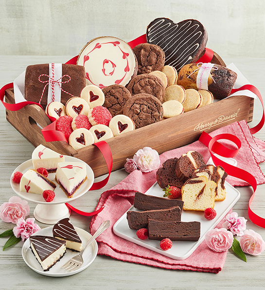 Valentine's Day gifts for her with a tray full of baked goods.