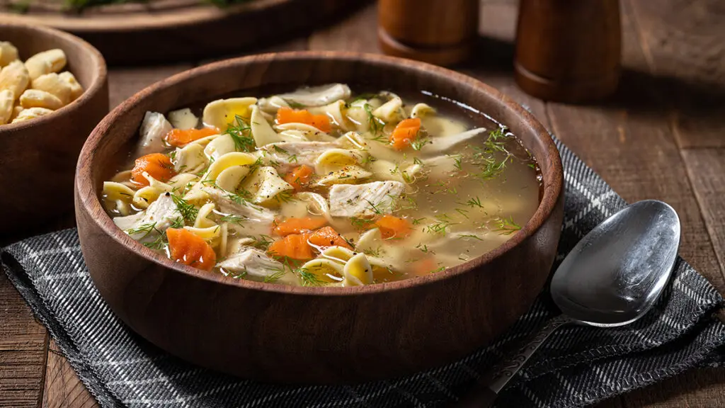 Chicken soup in a bowl.