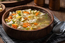 Chicken soup in a bowl.
