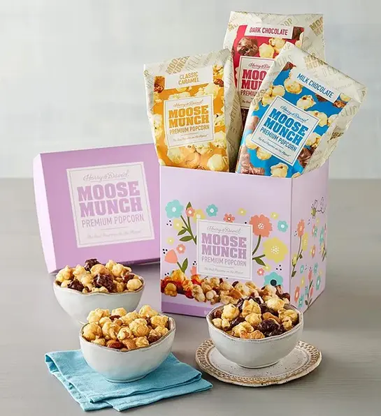 Easter basket stuffers with a box of different flavors of Moose Munch.