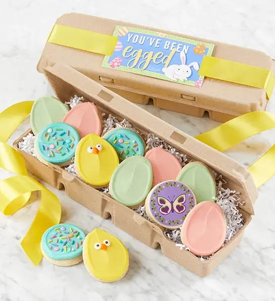 Easter gift ideas with a carton of Easter cookies.