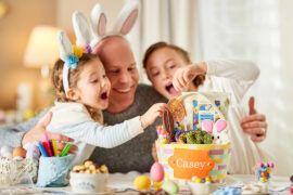 Easter gift ideas with a family opening Easter gift baskets.