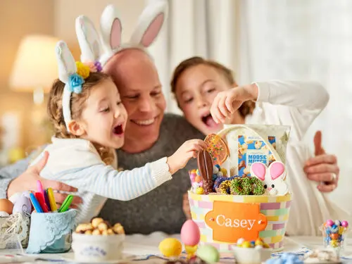 Easter gift ideas with a family opening Easter gift baskets.