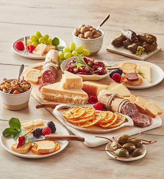 Undercover Snacks tapas board spread with cheese, meat and other snacks.