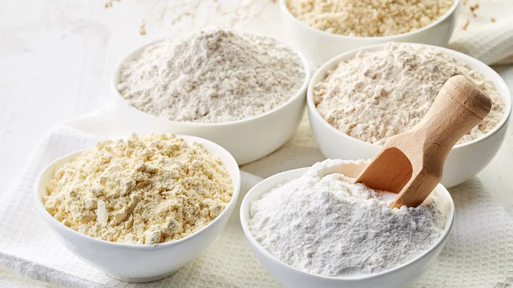 What is gluten with several bowls of gluten free flour.