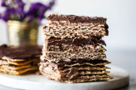 Passover dessert of a chocolate-matzo layer cake on a plate.