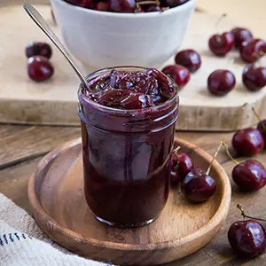 Cherry recipes with a jar of cherry compote