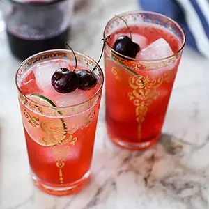 Cherry recipes with two glasses of cherry limeade.
