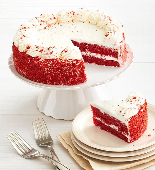 Gluten free cakes with a red velvet cake on a platter.
