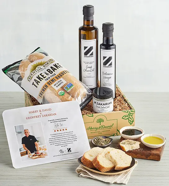 Mother-in-law gifts with a box of olive oil and bread.