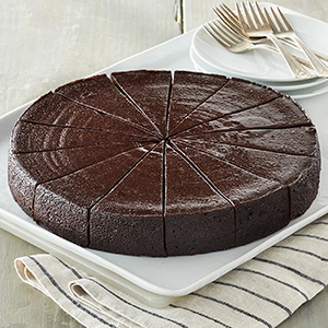 Flourless Belgian chocolate cake on a plate.