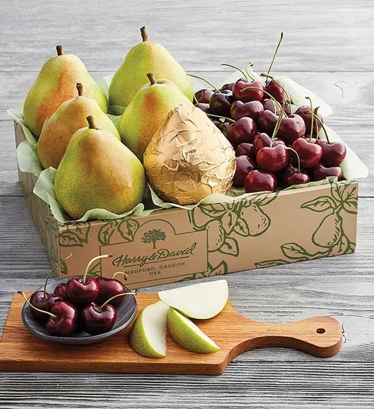 Types of cherries and pears in a gift box.