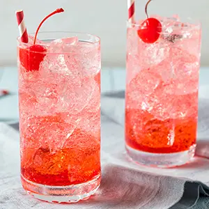 Shirley Temple drinks on a table.