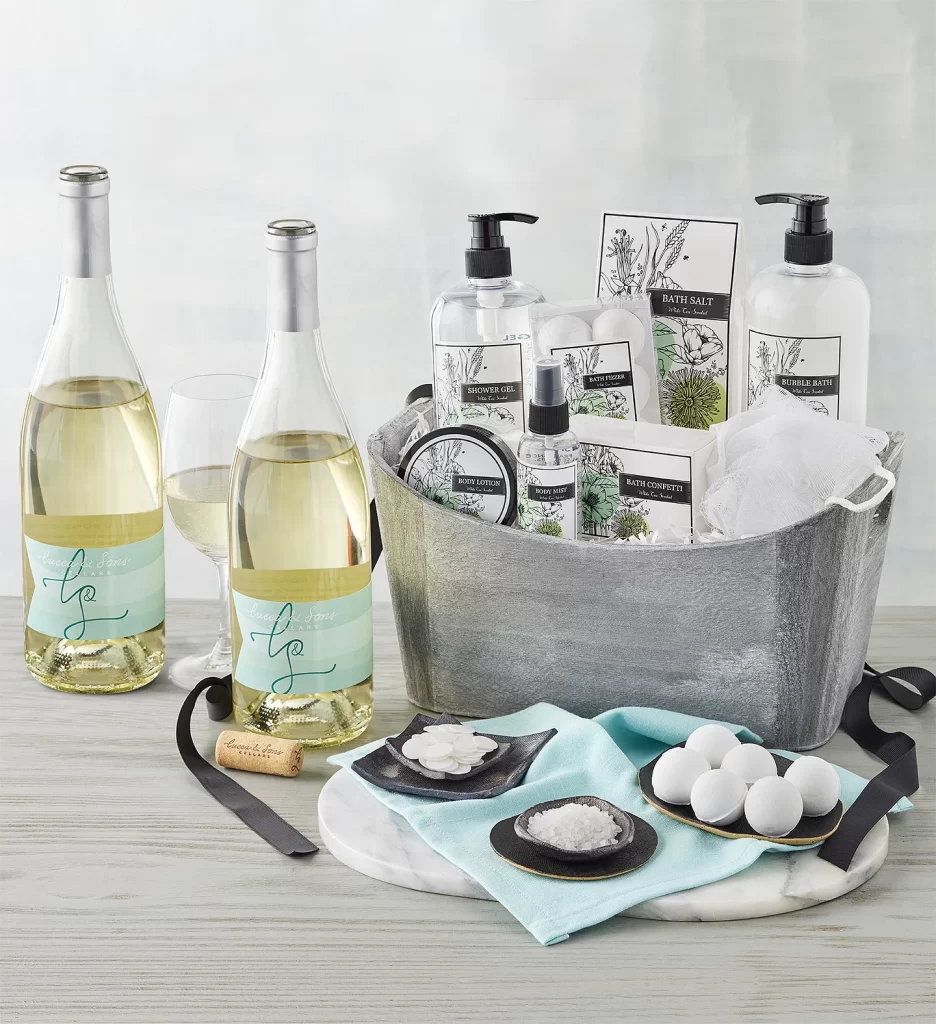 https://www.harryanddavid.com/blog/wp-content/uploads/2023/11/wine-basket-gift-ideas-white-wine-tea-spa-gift-set-936x1024.webp