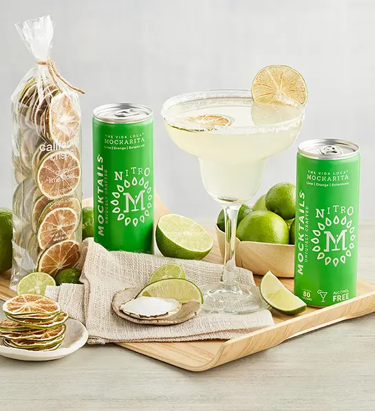 Mocktail food pairings with a margarita mocktail kit with dried fruit and fresh lime.