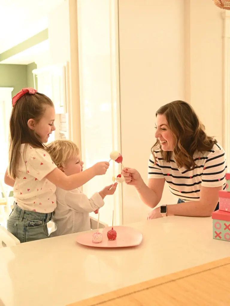 Jen Naye Herrmann with daughter and son eating cake pops.