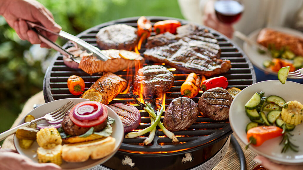 Spring break ideas with a grill full of meat and vegetables.