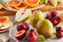 Ways to use fruit with several types of fruit displayed on boards.